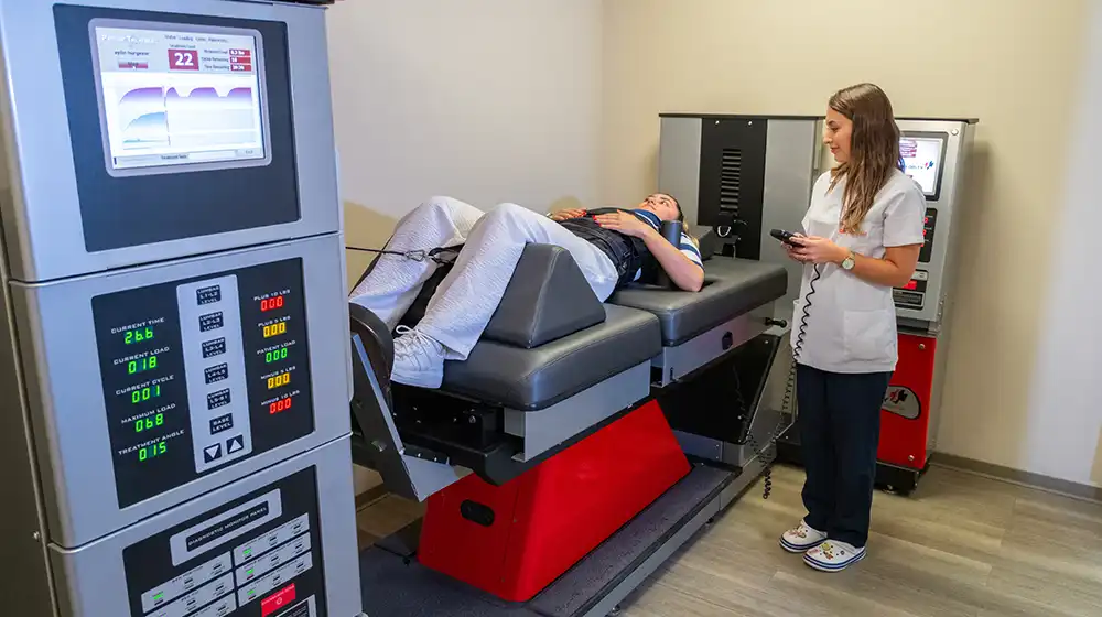 Système de décompression spinale assistée par ordinateur